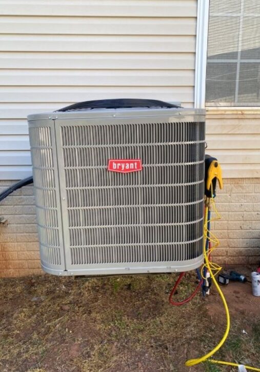 HVAC unit being repaired